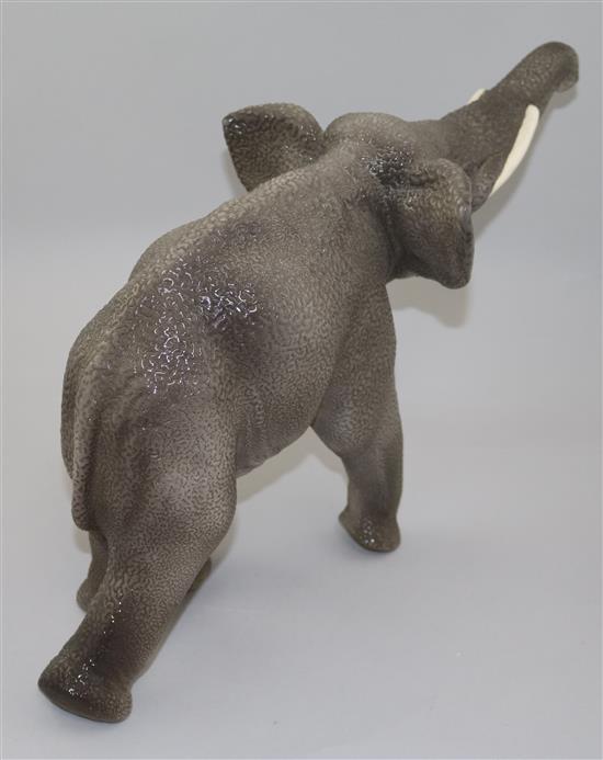 A Sevres Vinsare model of a trumpeting elephant, L.18in.